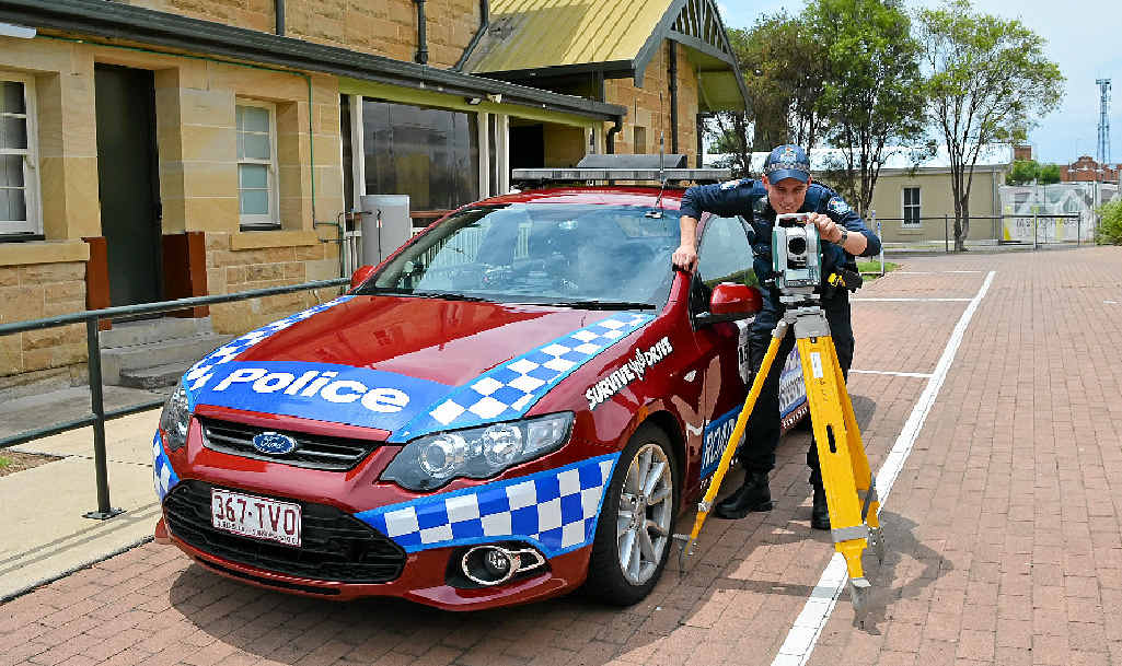 MOTORISTS TAKE CARE: Constable Phil Wenban with the forensic crash mapping device that has been used far too often.